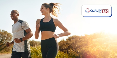 man and woman wearing workout gear running outside